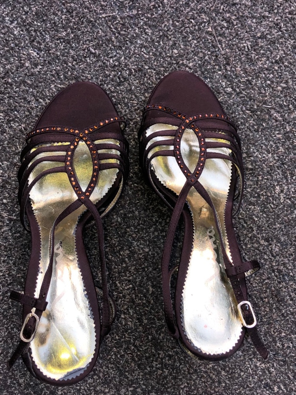 brown satin strappy heel by Nina feature gold rhinestone embellishments.